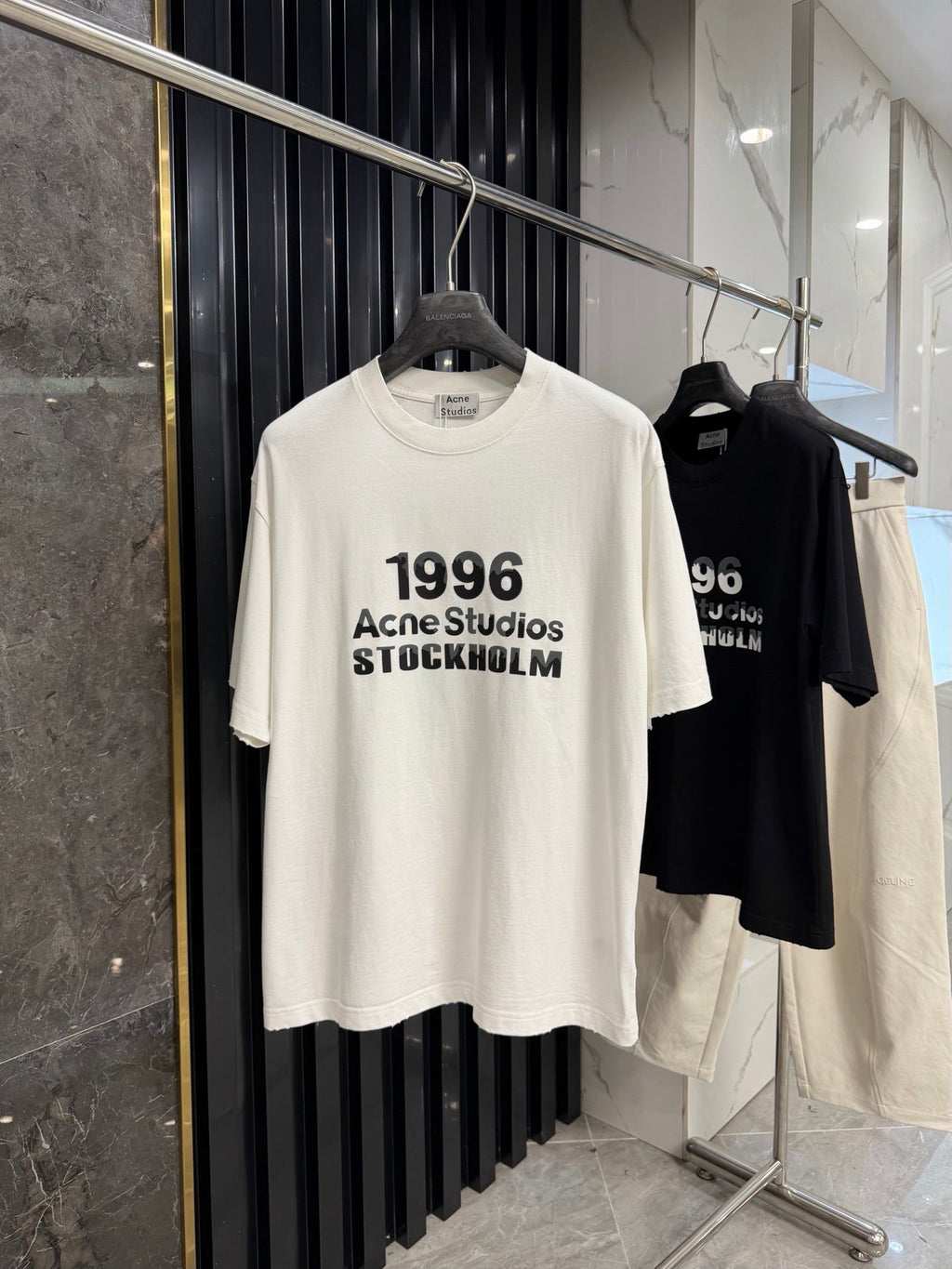 Acne Studios Stockholm 1996 Stacked‑Text Distressed‑Hem Oversized Crew‑Neck T‑Shirt